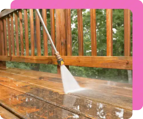 pressure-washing-done-on-a-wooden-deck